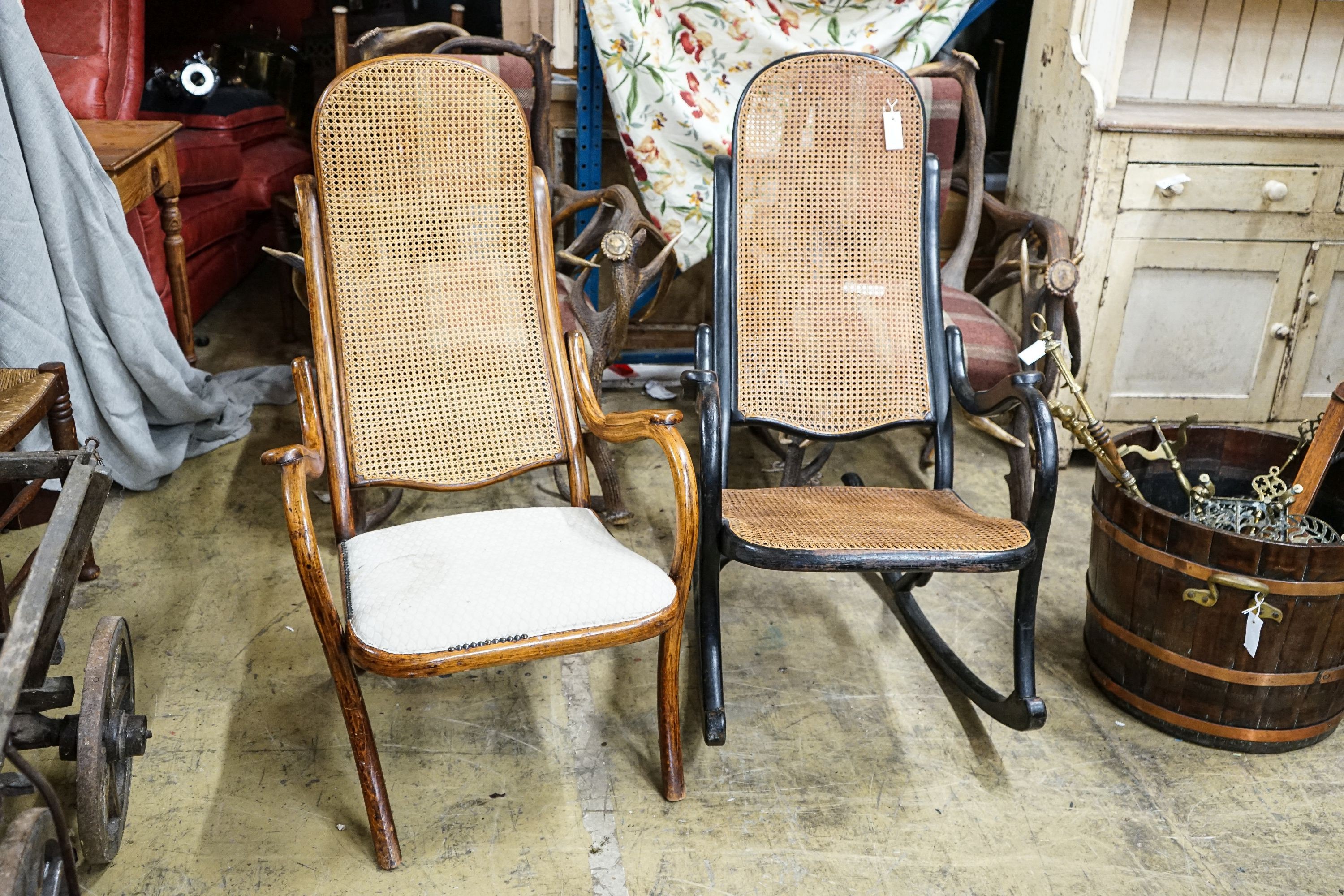 An ebonised Thonet-style caned Bentwood rocking chair and one other bentwood chair